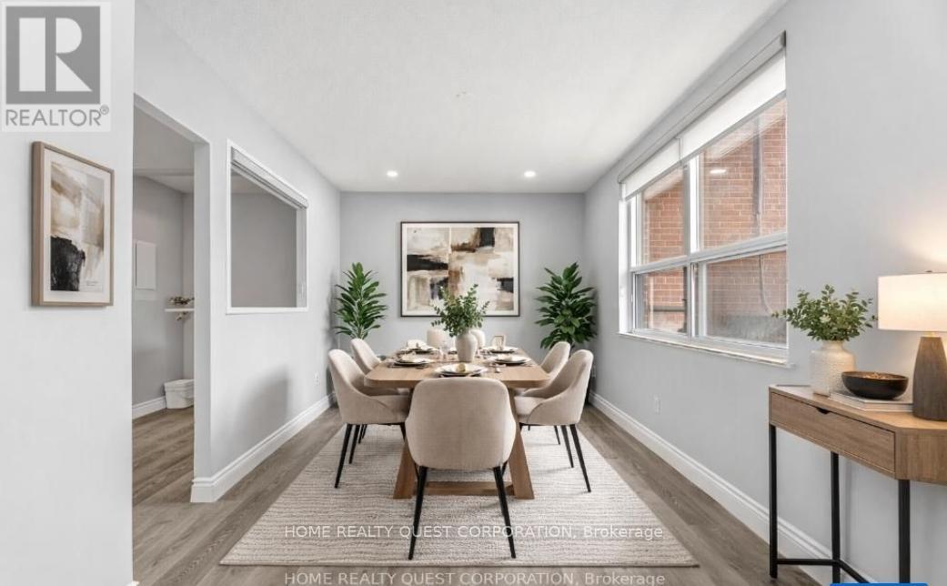 A dining room with a table set for six.