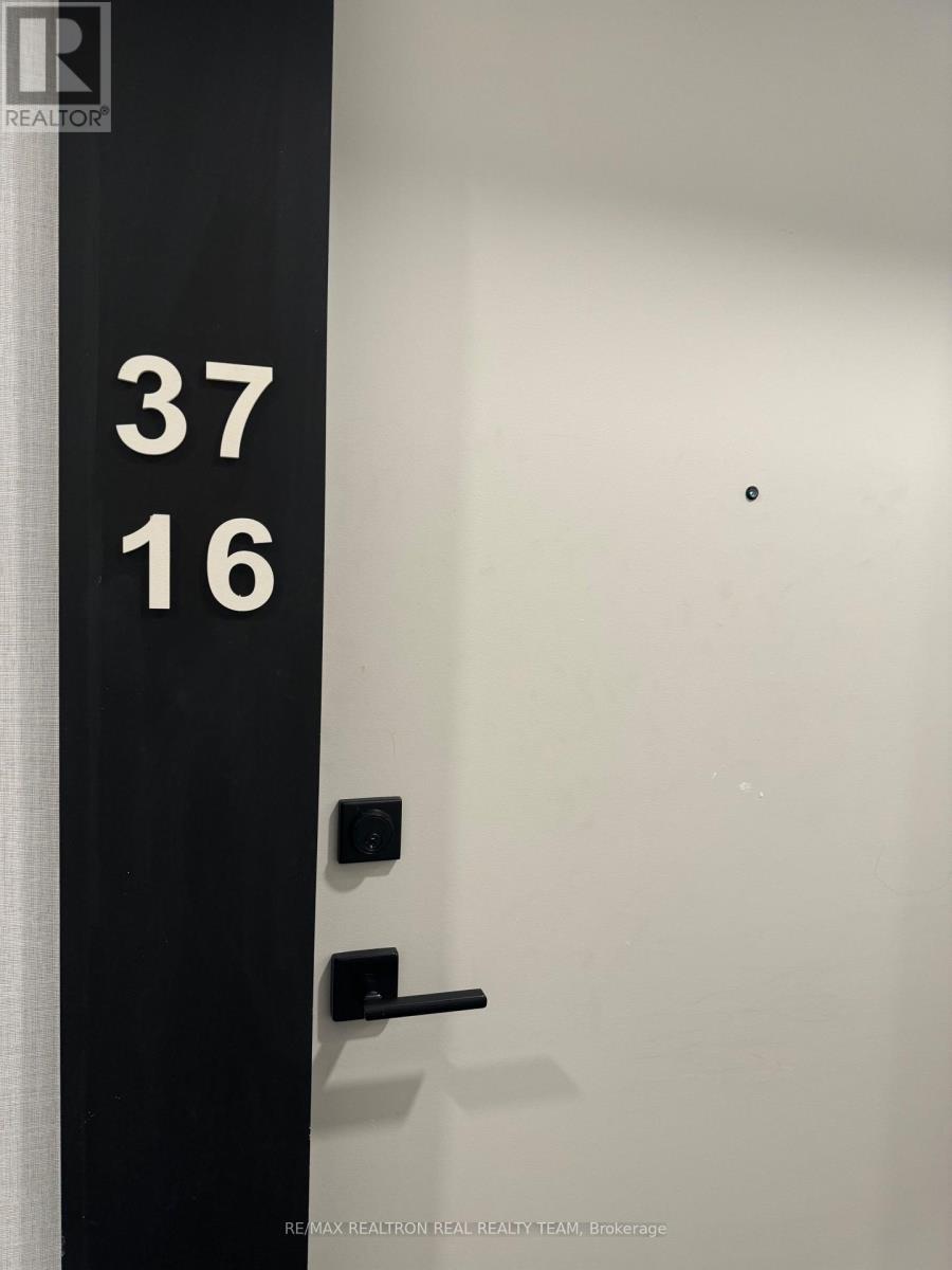 A door with the number 3716 on the door frame.