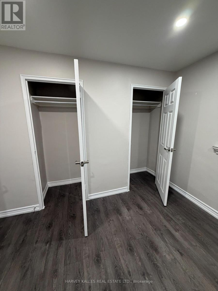 A brokerage office with two open doors.