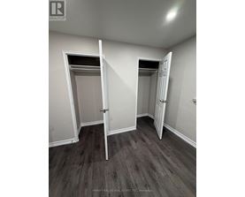 A brokerage office with two open doors.