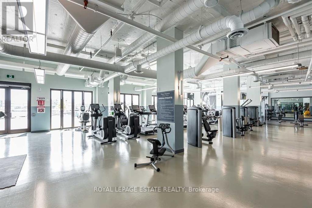 A gym with a variety of equipment is shown.