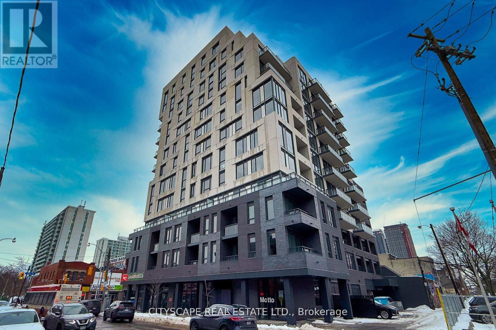 A tall building with a sign that reads "Citycape Realtor" is the main focus of the image.