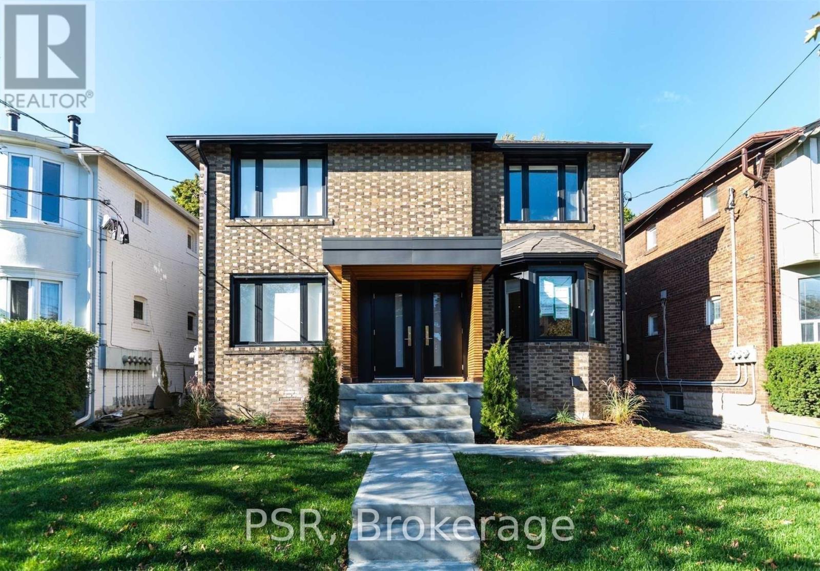A house with the text "PSR Brokerage" in front of it.
