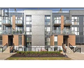 A modern apartment building with a sign that reads "KELLER WILLIAMS REFERENCED URBAN REALTY, Brokerage".