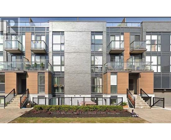 A modern apartment building with a sign that reads "KELLER WILLIAMS REFERENCED URBAN REALTY, Brokerage".