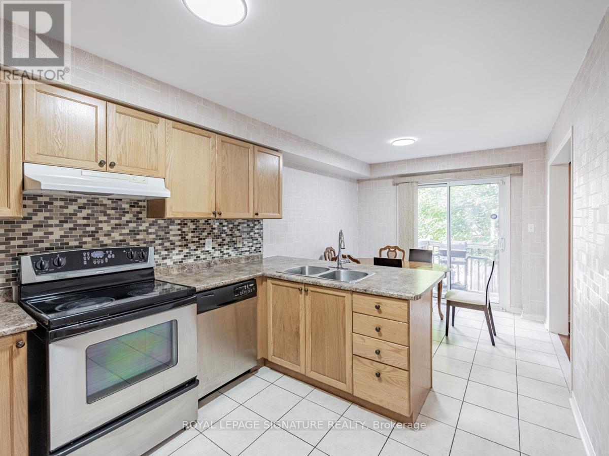 A kitchen with a stove top oven and a counter top.