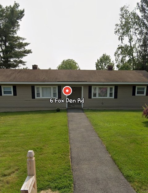 A house with the name 6 Fox Den Rd on it.