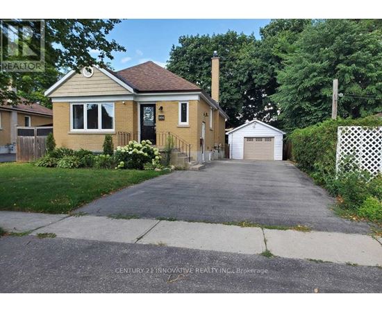 A house with a driveway in front of it.