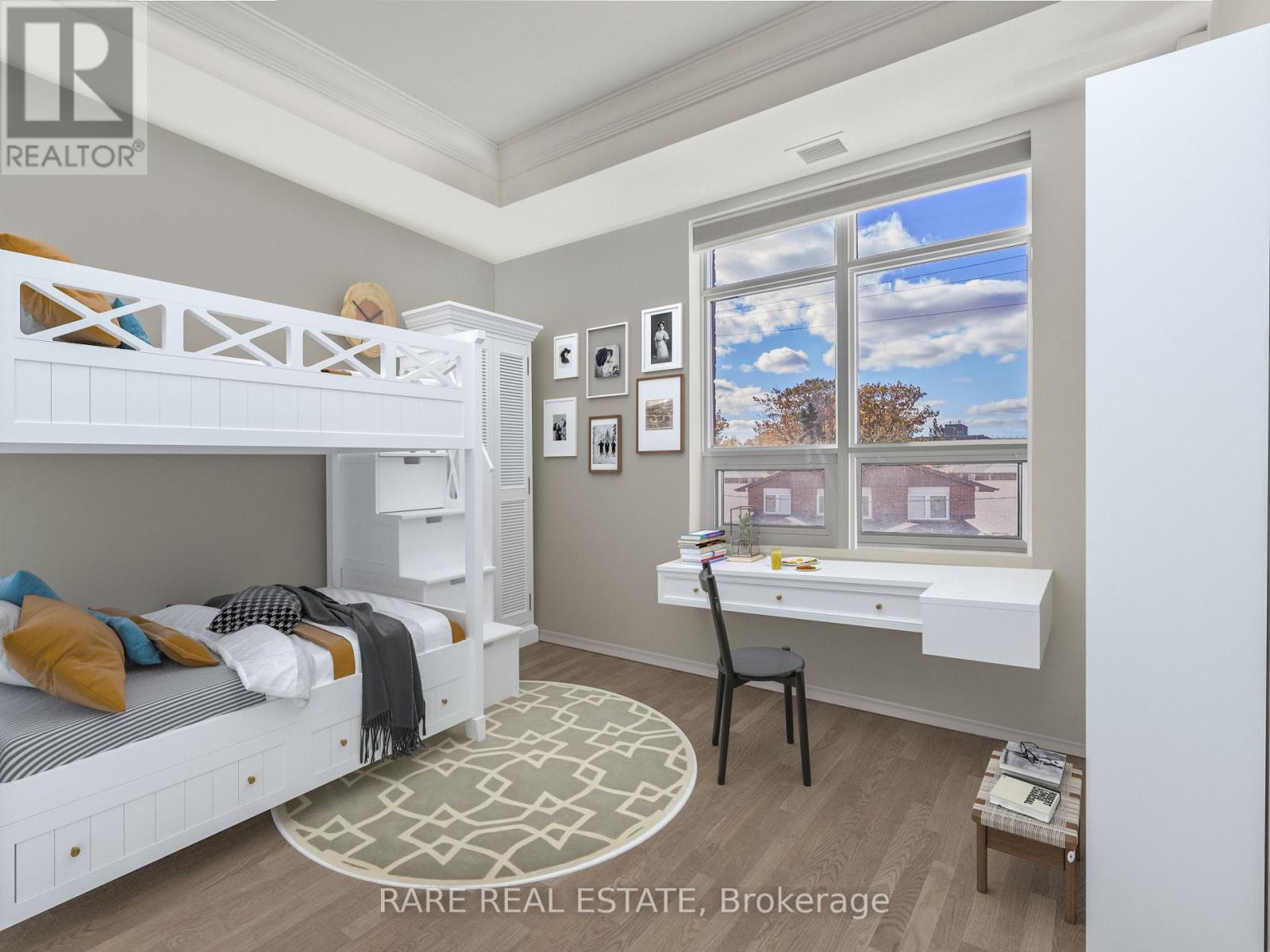 A bedroom with a bunk bed and a desk with a chair.