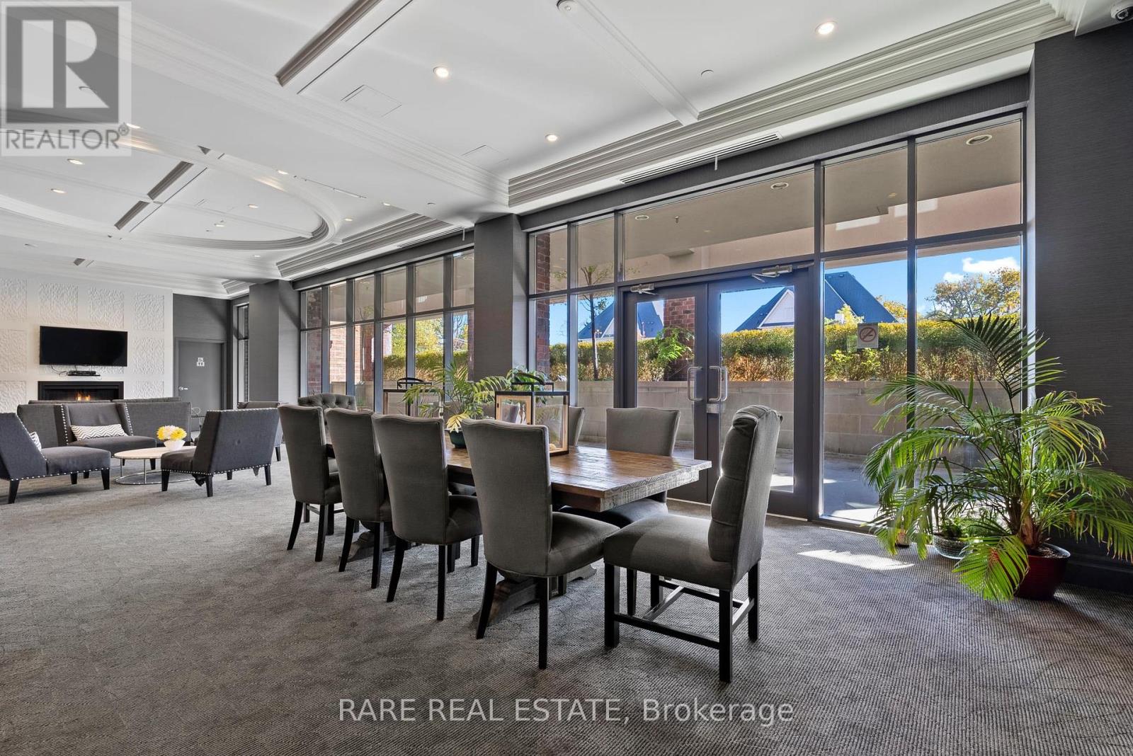 A dining room with a long table and chairs is on the market.