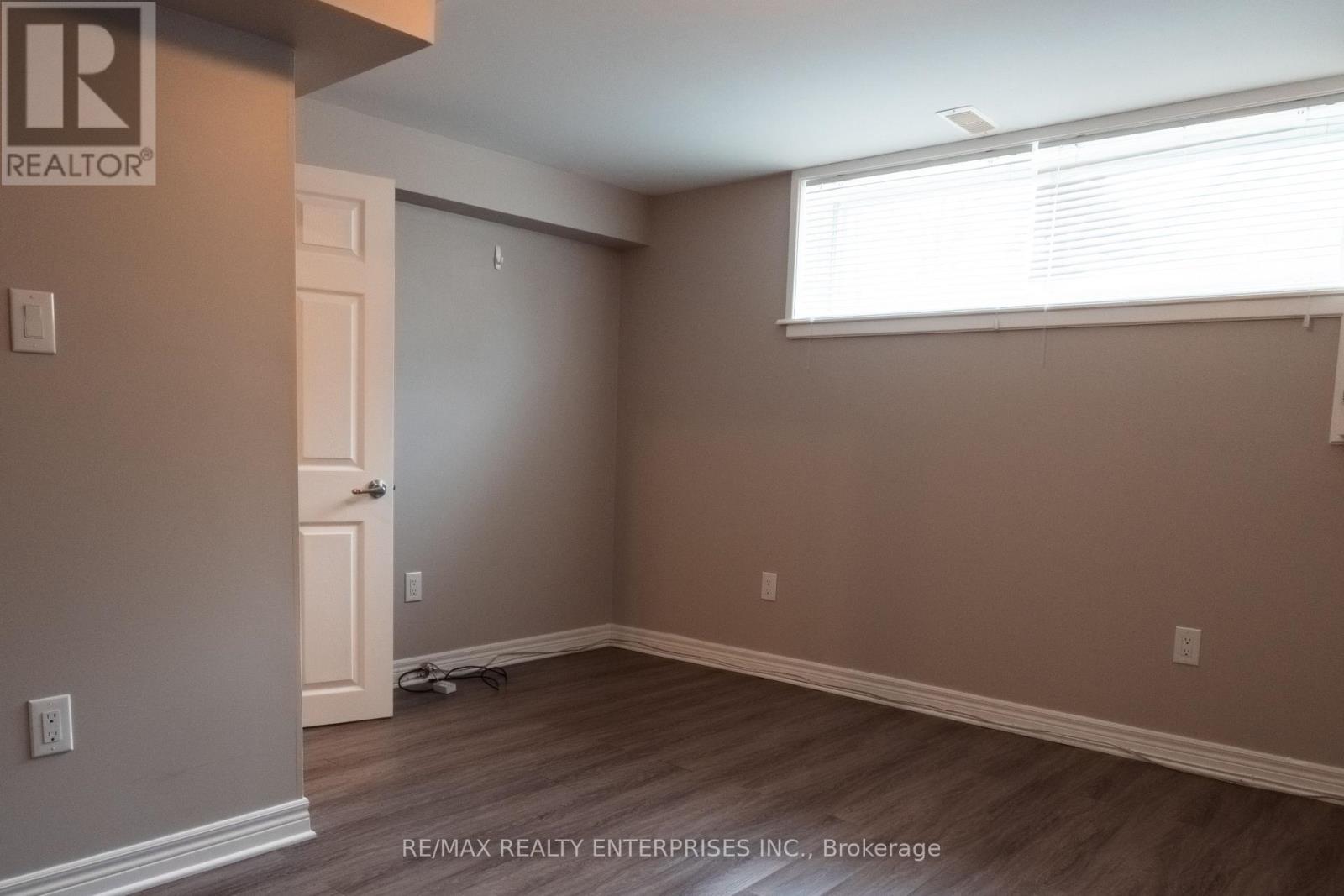 A room with a door and a window.