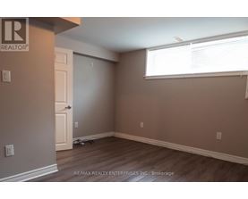 A room with a door and a window.
