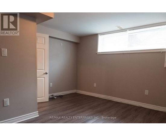 A room with a door and a window.