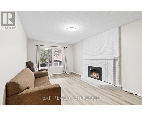 A living room with a fireplace and a couch.