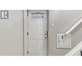 A white door with a glass window above it.