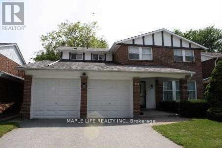 A house with a white garage door is for sale.