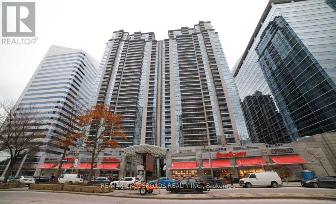 A tall building with a sign that says "REALTOR" in front of it.
