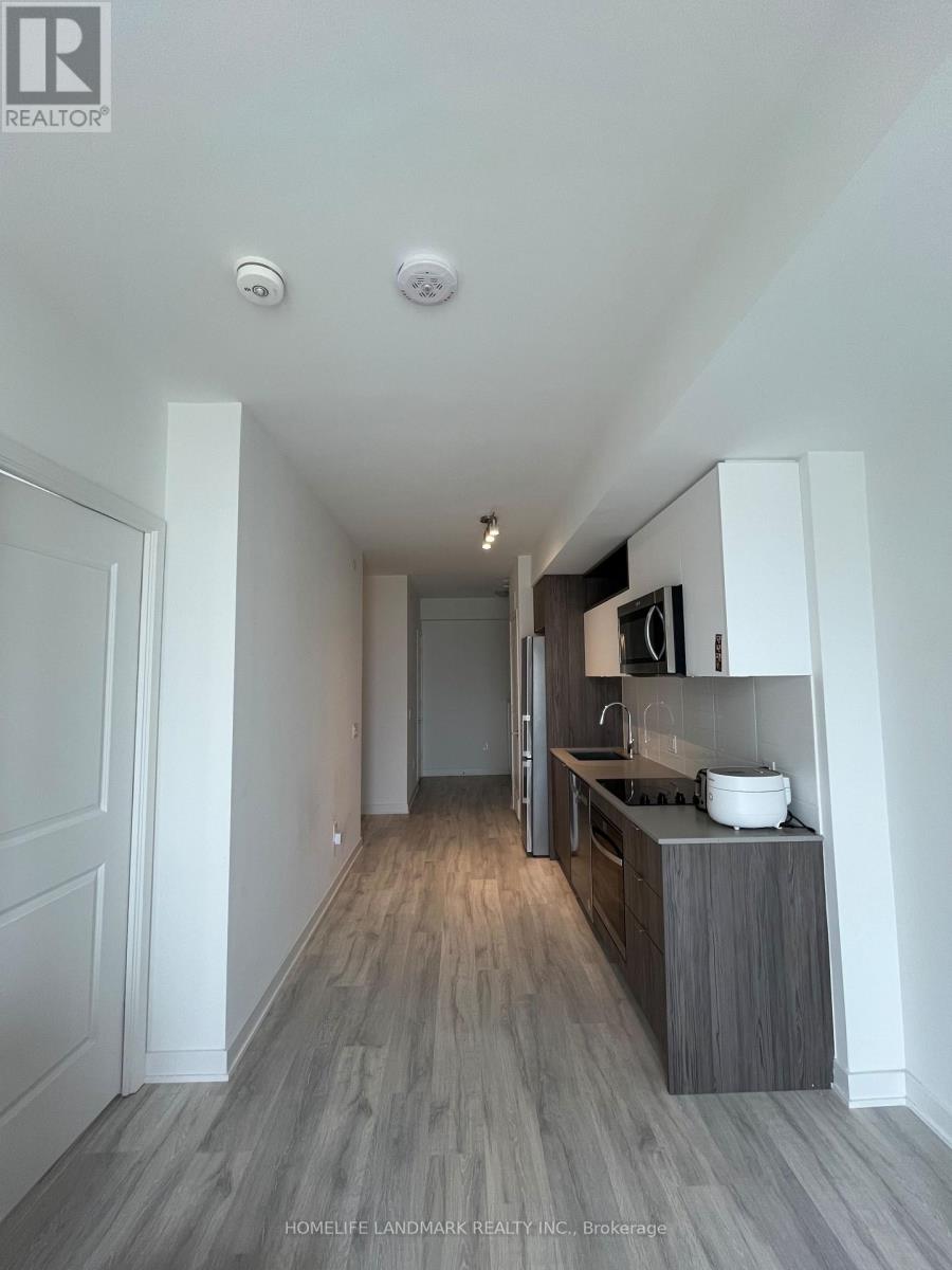 A kitchen with a white bowl on the counter.