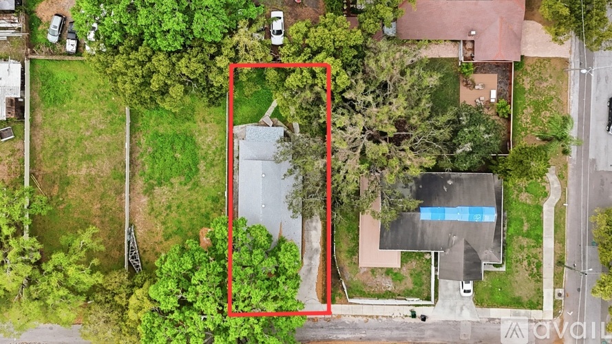 A red square highlights a section of a bird's-eye view of a residential area with a pool.