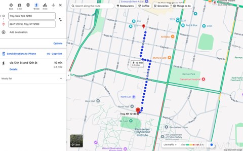 A map with a blue dotted line indicating a route from 13th St to 12th St.