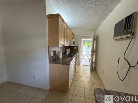 A kitchen with a counter and cabinets.
