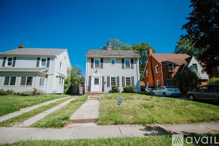 A house with a sign in front of it that says "available".