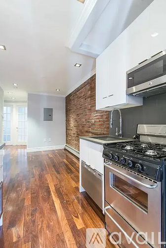 A kitchen with a stove and oven.