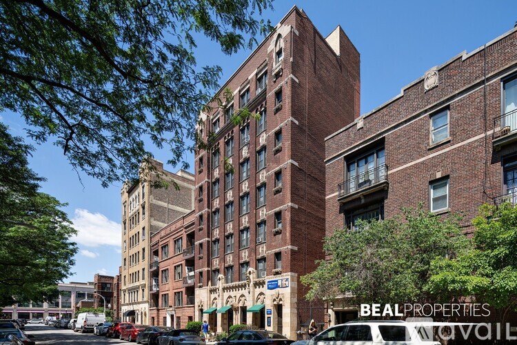 A street view of a building with the words "BEAL PROPERTIES" on the side.