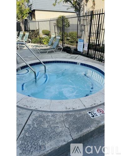 A small pool with a blue tinted water.