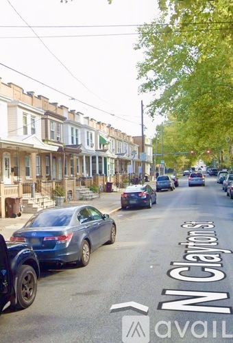 A street view of North Clarion Street with cars parked on the side.