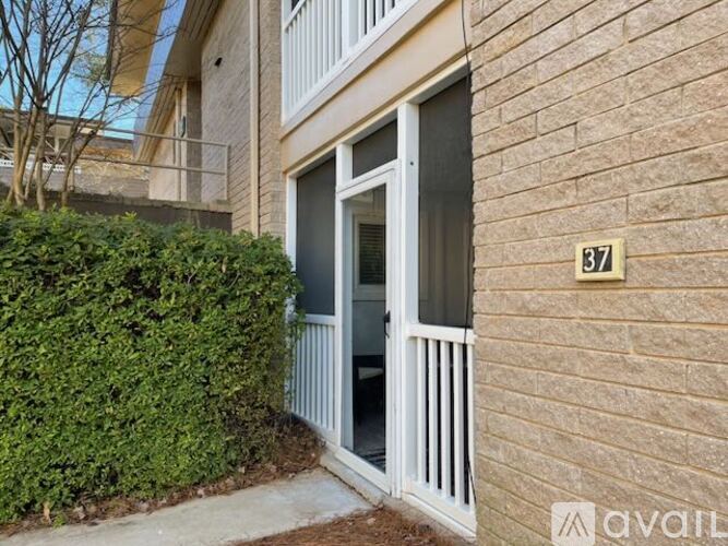 A building with a number 37 on the wall.