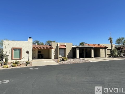 A house with a driveway in front of it.