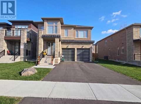 A large house with a driveway in front of it.