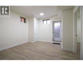 A room with a door and a window.