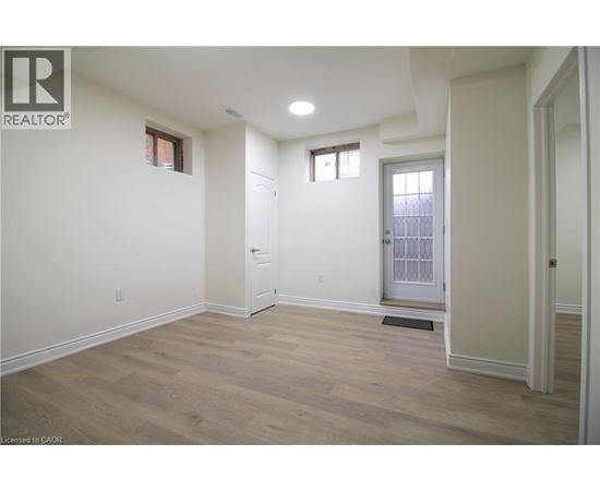 A room with a door and a window.