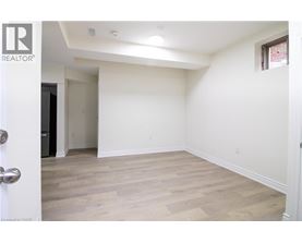 A room with a door and a window.
