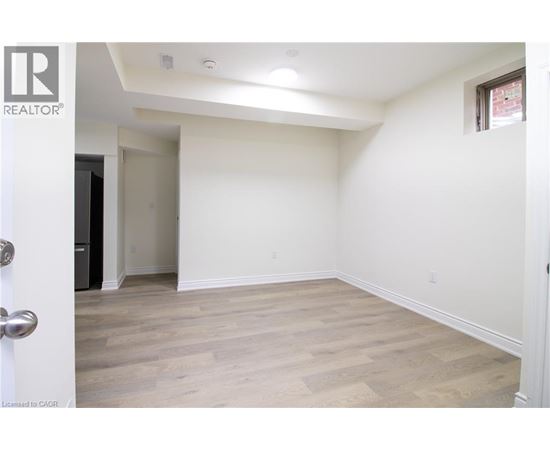 A room with a door and a window.
