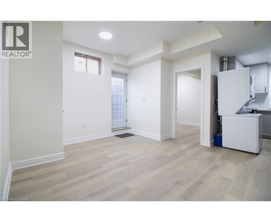 A realtor logo is on the top left corner of the image.