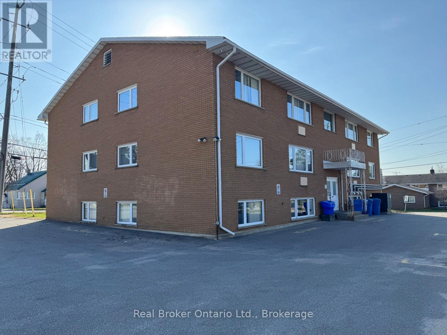A building with the Real Broker Ontario Ltd. logo on it.