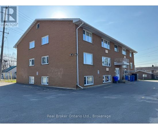 A building with the Real Broker Ontario Ltd. logo on it.
