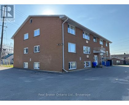 A building with the Real Broker Ontario Ltd. logo on it.