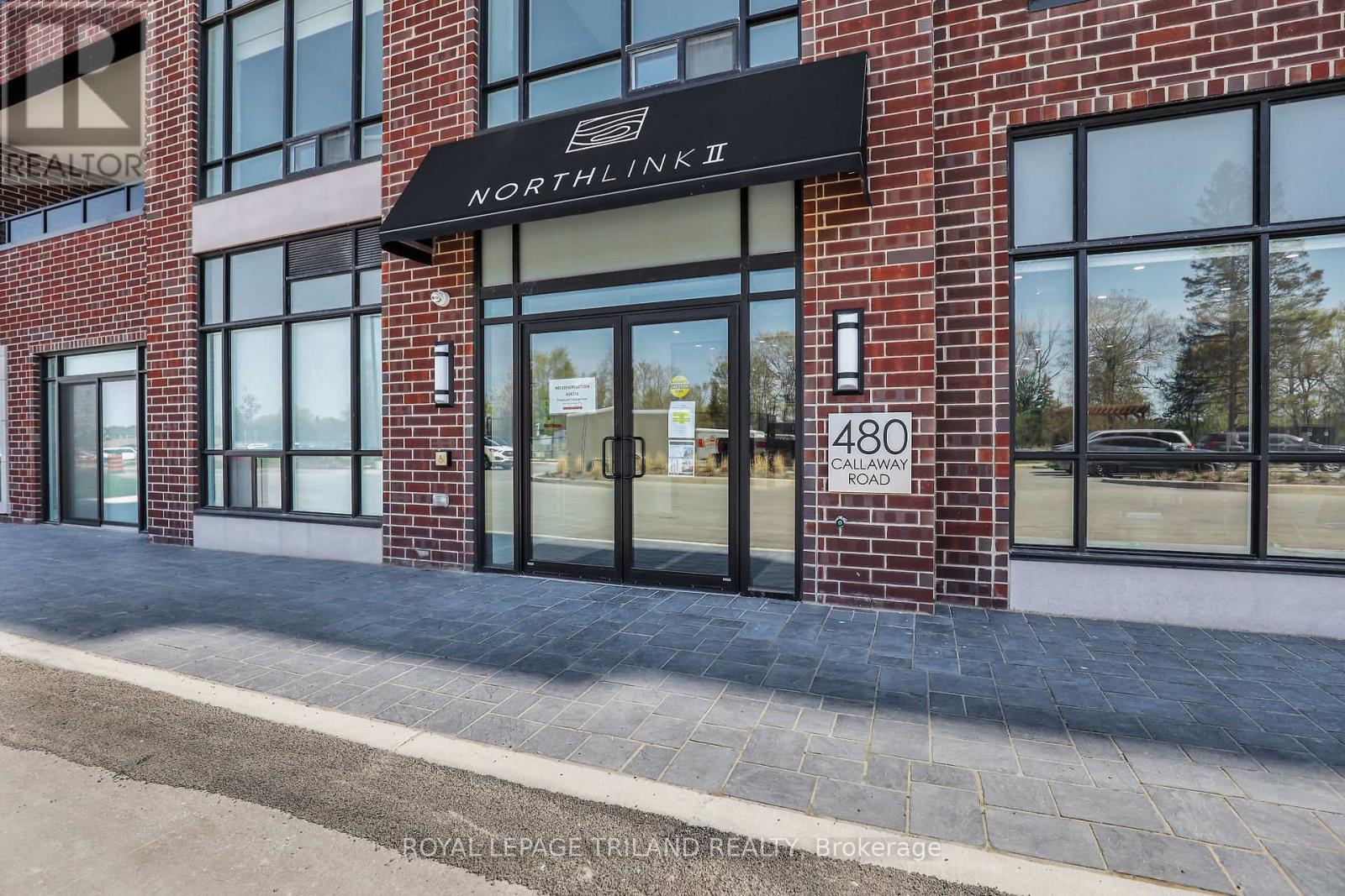 The image shows the front of a building with a sign that reads "NORTHLIN KII" and the address "480 CALLAWAY ROAD".