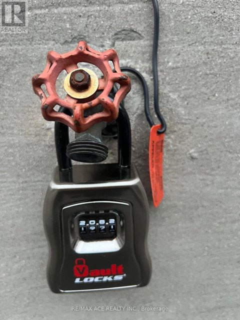 A padlock with a digital keypad and a cable attached to it.