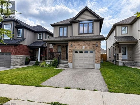A house with a garage in front of it.