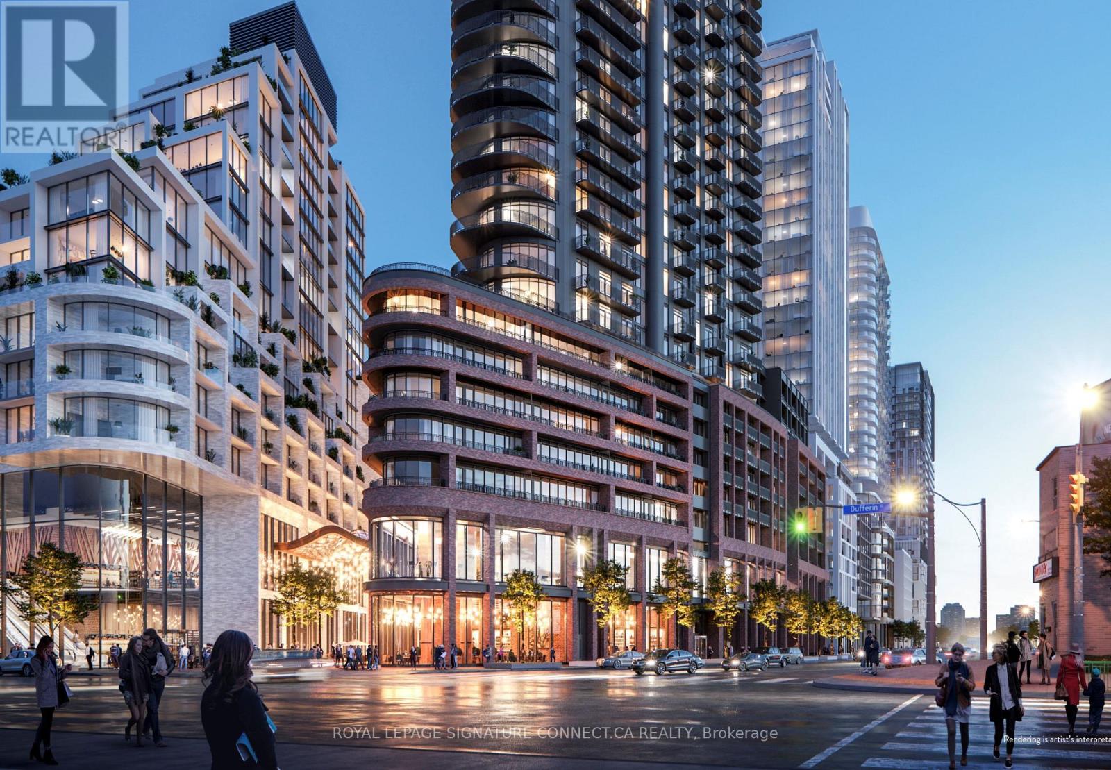 A city street with people walking and modern buildings.