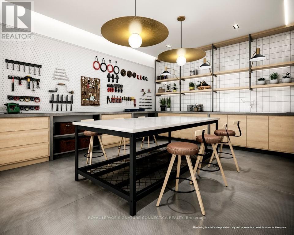 A kitchen with a table and chairs in the middle of it.