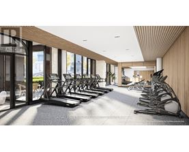 A gym with treadmills and a sign that says "REALTOR".