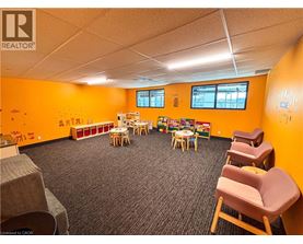 A room with chairs and tables is shown.