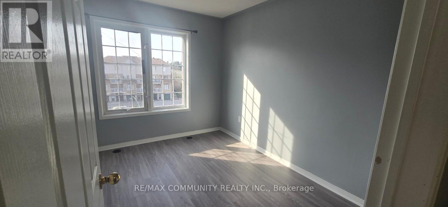 A room with a door and a window.