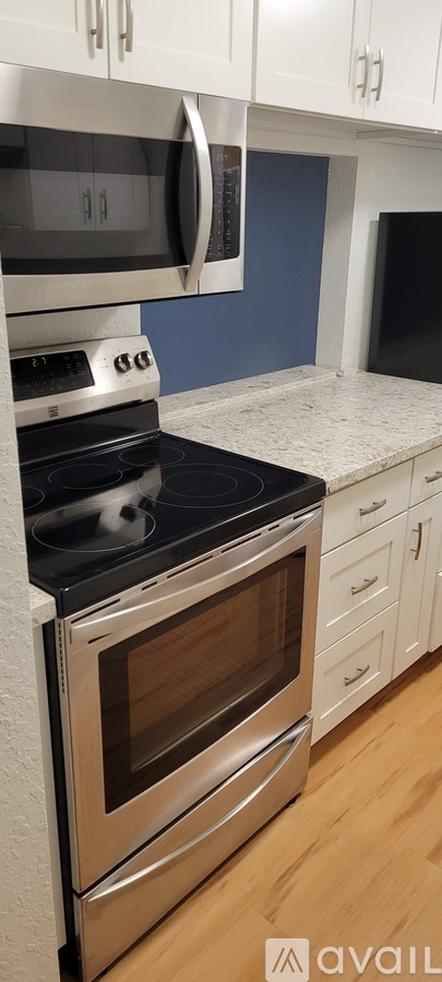 A modern kitchen with a stove and oven.